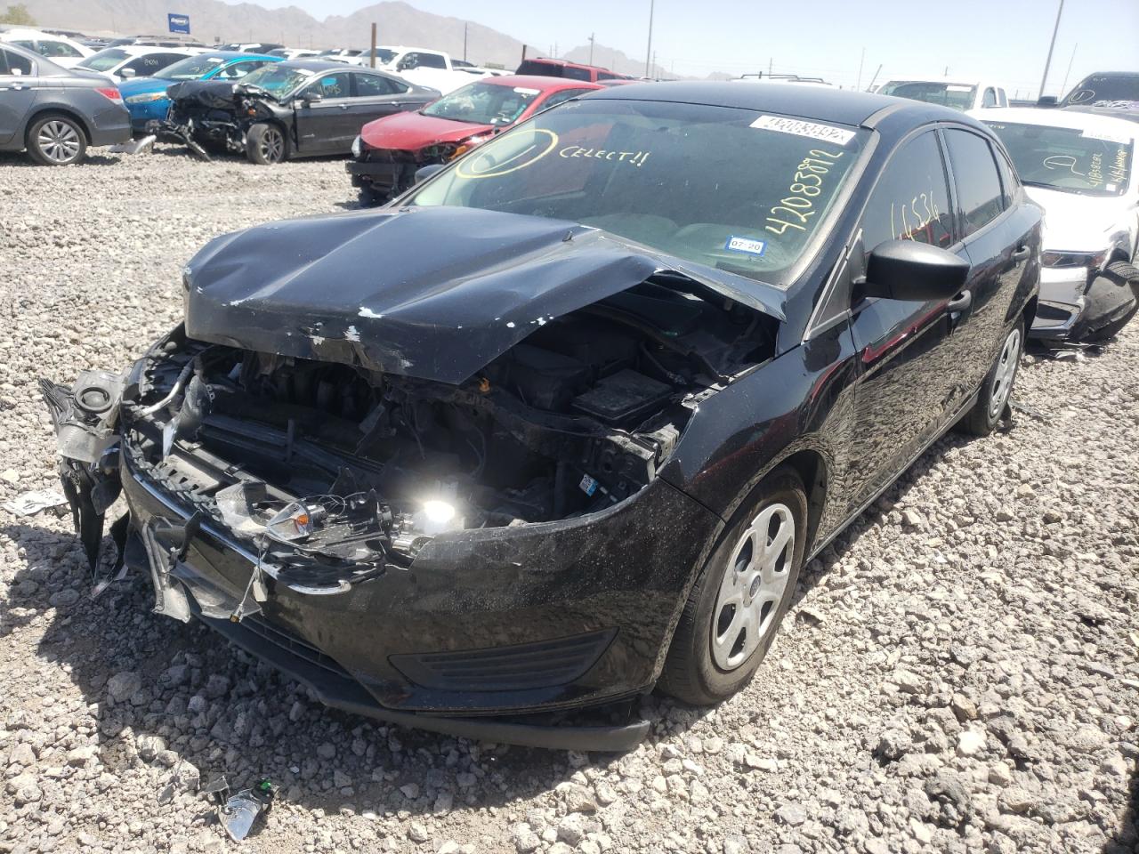 Photo 2 from auction – 2017 FORD FOCUS S with VIN 1FADP3E21HL254051