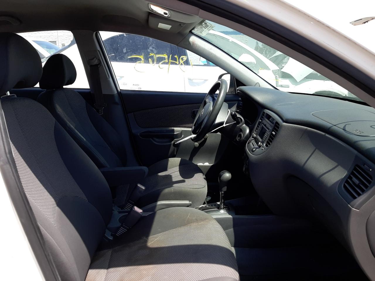 Photo 5 from auction – 2011 KIA RIO BASE with VIN KNADH4A37B6917640