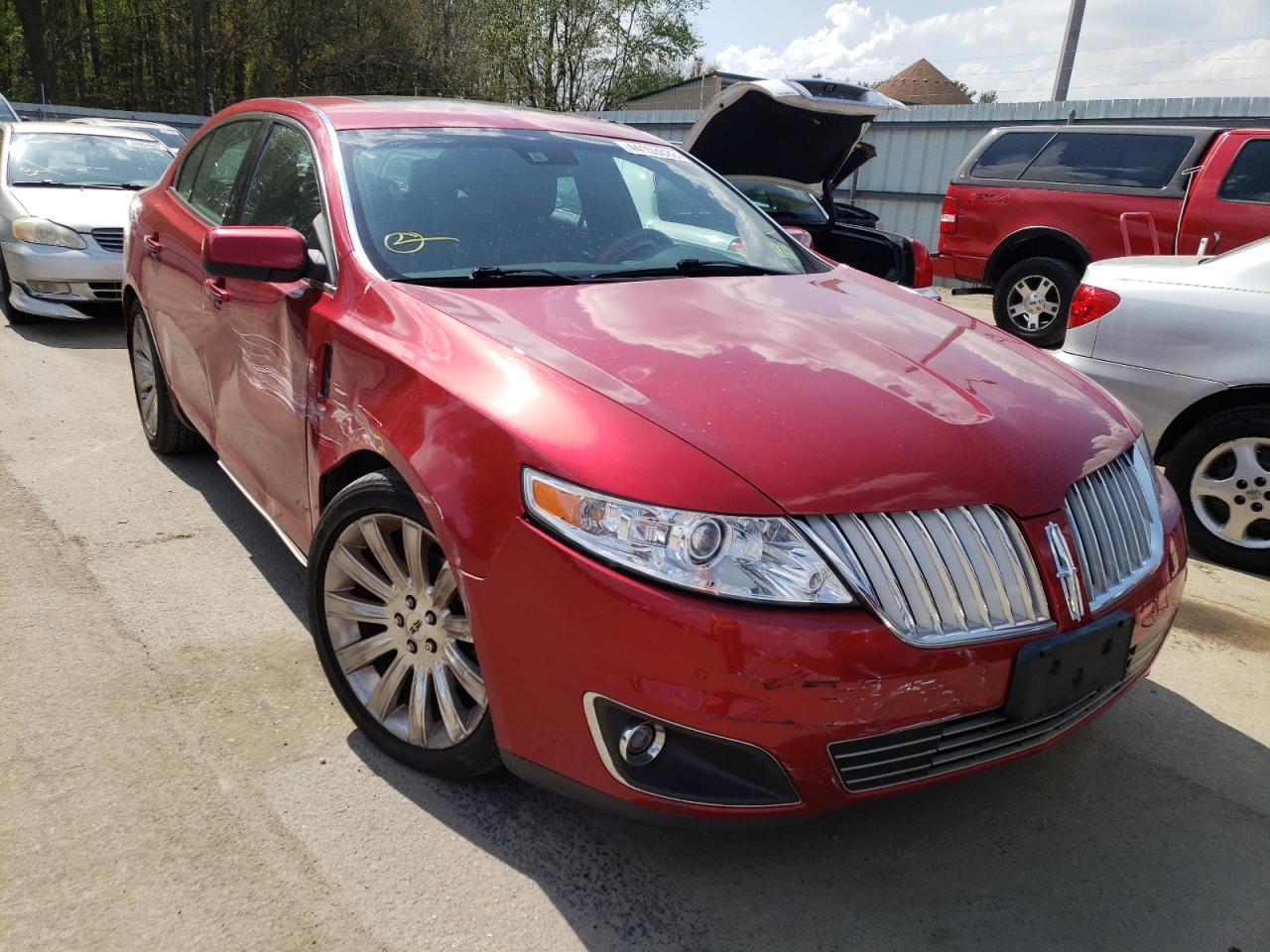 LINCOLN MKS 2012 with VIN 1LNHL9FTXCG803924 - Photo from auction