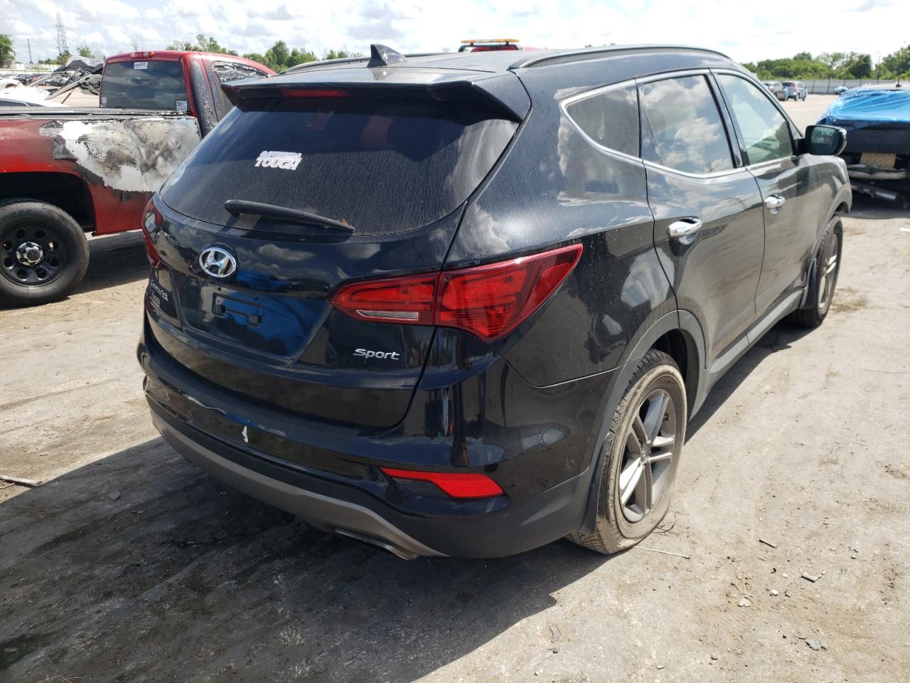 Photo 4 from auction – 2017 HYUNDAI SANTA FE S with VIN 5NMZU3LB9HH020298