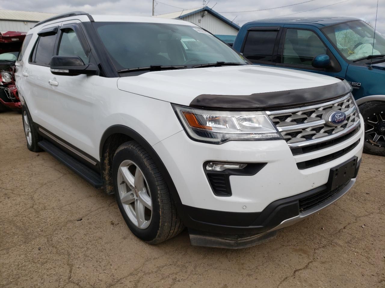 FORD EXPLORER X 2018 with VIN 1FM5K7D86JGA67697 - Photo from auction