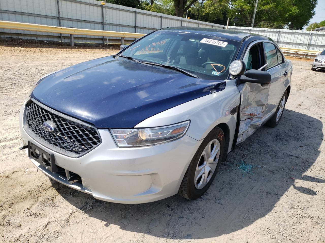 Photo 2 from auction – 2014 FORD TAURUS POL with VIN 1FAHP2MK4EG153703