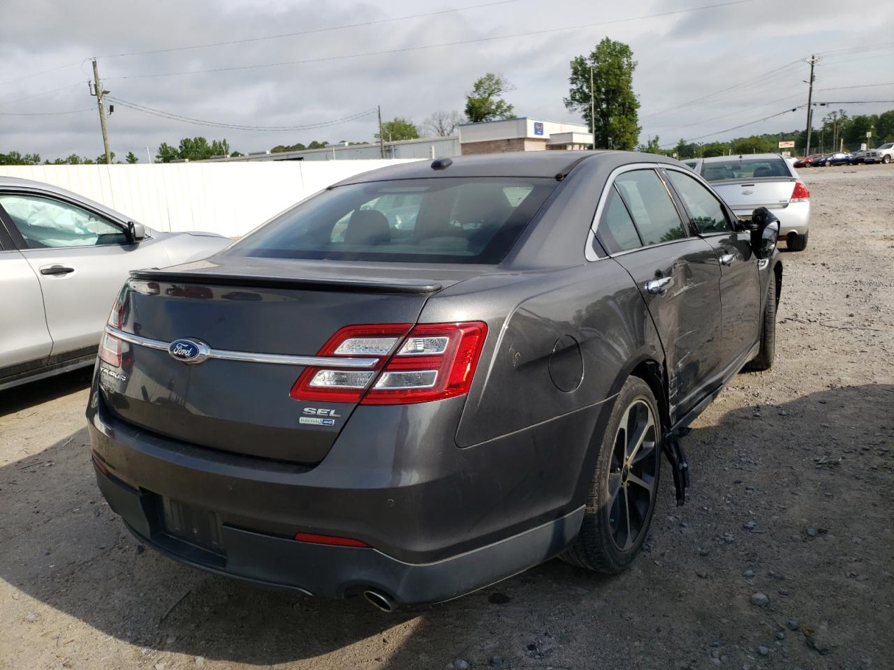 Photo 4 from auction – 2015 FORD TAURUS SEL with VIN 1FAHP2H81FG181605
