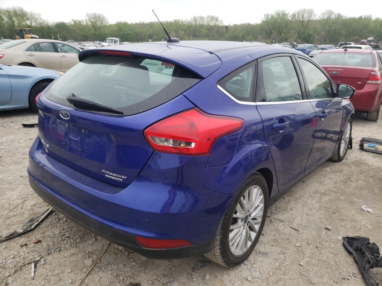 Photo 4 from auction – 2015 FORD FOCUS TITA with VIN 1FADP3N26FL208034