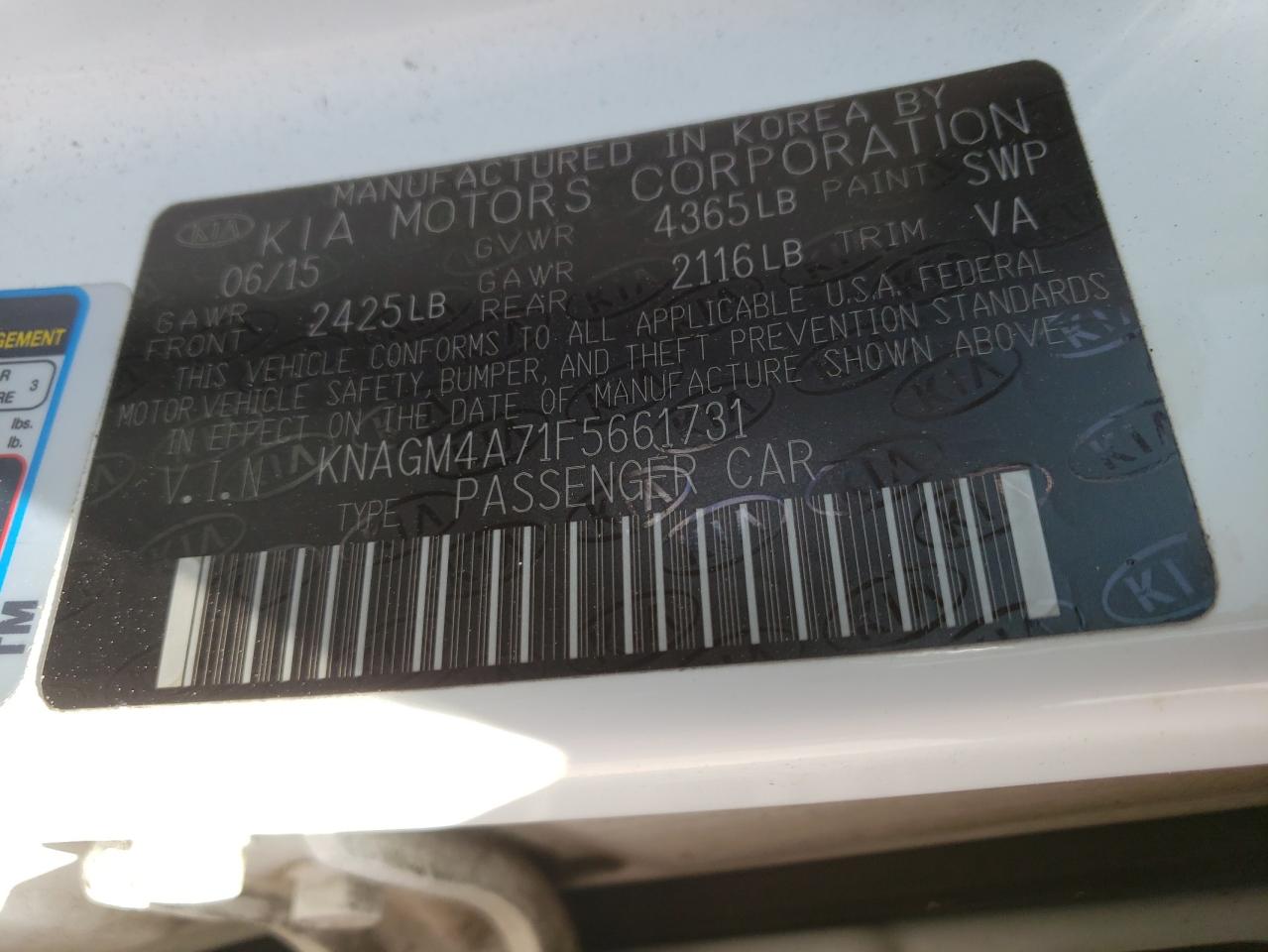 Photo 10 from auction – 2015 KIA OPTIMA LX with VIN KNAGM4A71F5661731