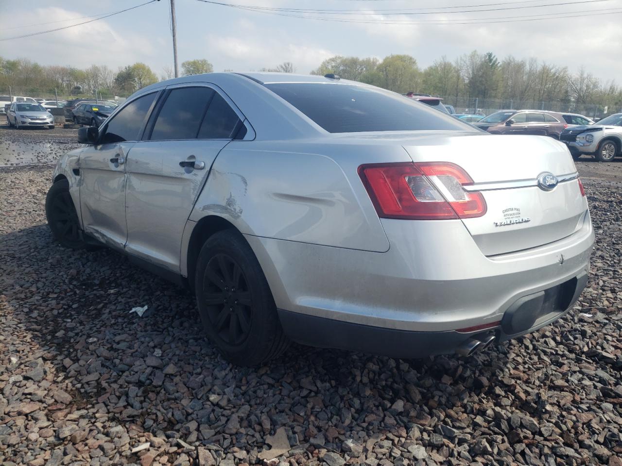 Photo 3 from auction – 2011 FORD TAURUS SE with VIN 1FAHP2DW4BG127570