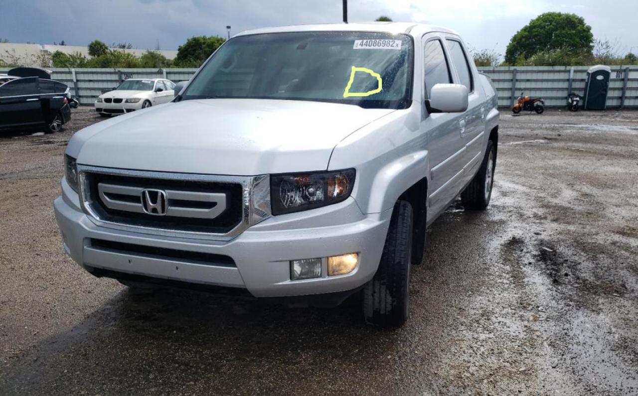 Photo 2 from auction – 2010 HONDA RIDGELINE with VIN 5FPYK1F56AB007759