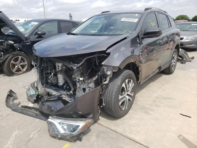 Photo 2 from auction – 2018 TOYOTA RAV4 LE with VIN JTMZFREV5JJ176567