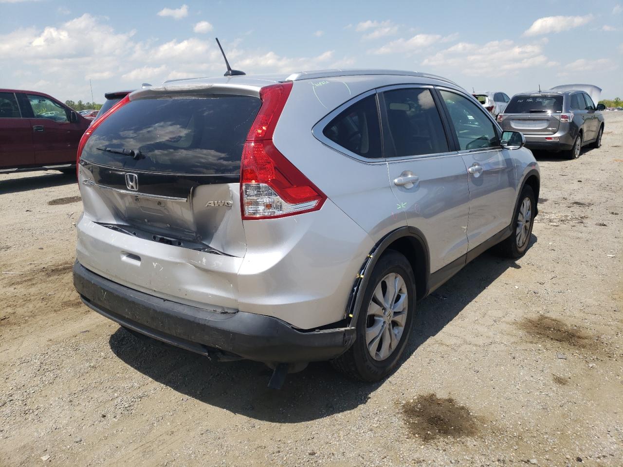 Photo 4 from auction – 2014 HONDA CR-V EXL with VIN 2HKRM4H79EH672606