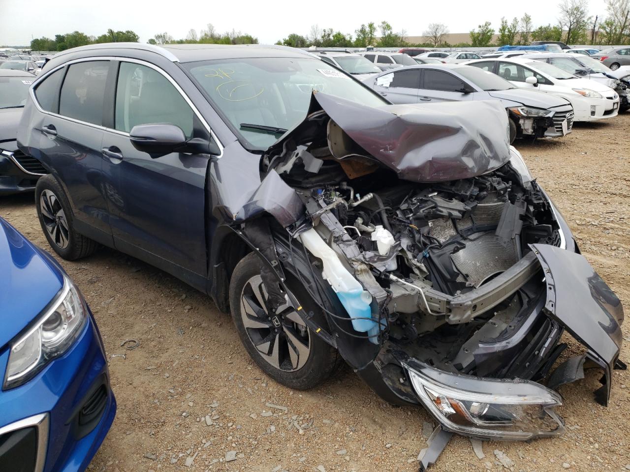 Photo 1 from auction – 2016 HONDA CR-V TOURI with VIN 5J6RM4H90GL013310