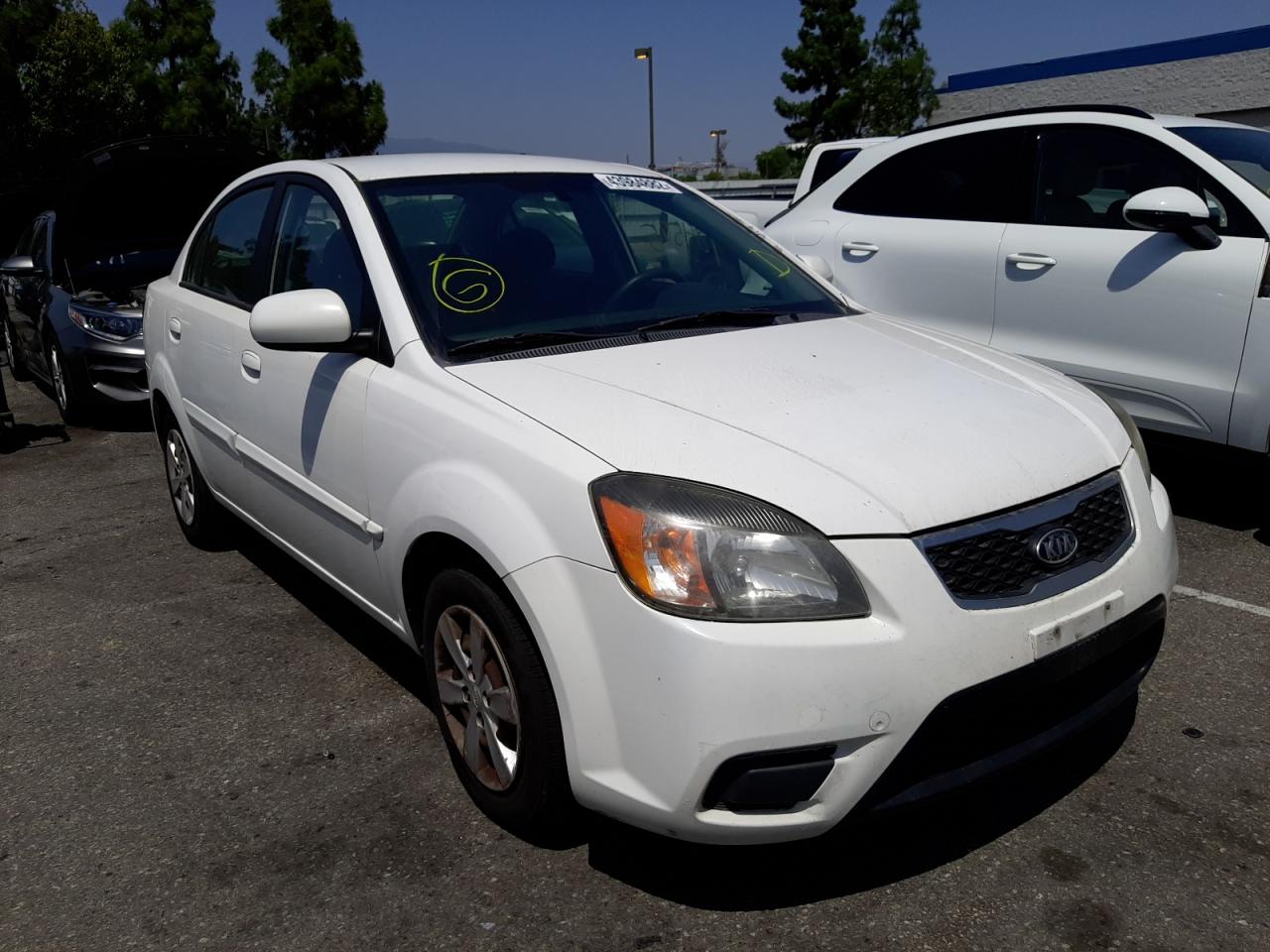 KIA RIO BASE 2011 with VIN KNADH4A37B6917640 - Photo from auction
