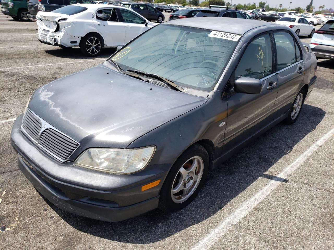 Photo 2 from auction – 2002 MITSUBISHI LANCER OZ with VIN JA3AJ86E12U065243