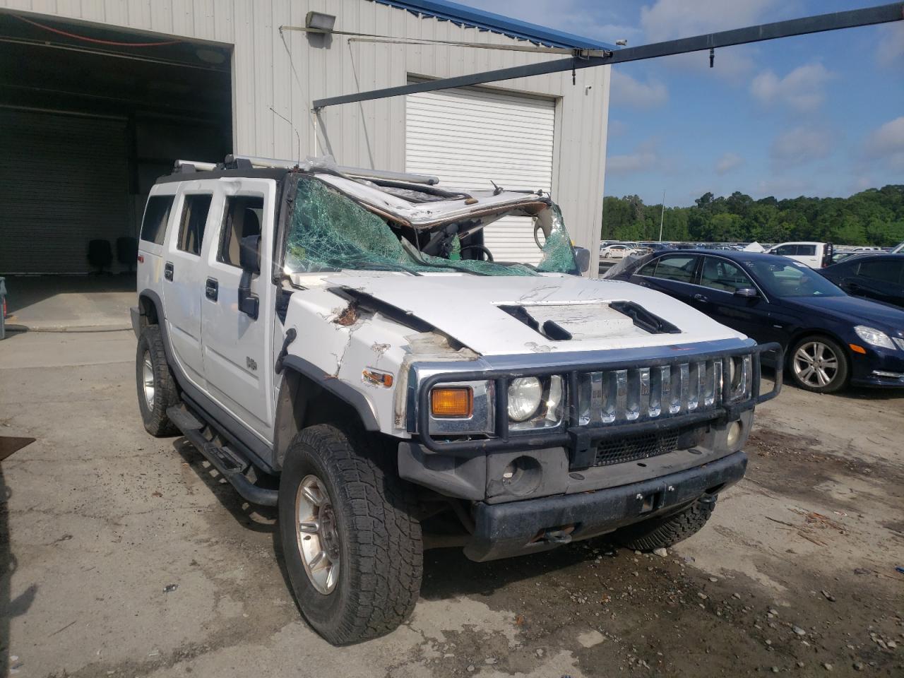HUMMER H2 2004 with VIN 5GRGN23UX4H113826 - Photo from auction