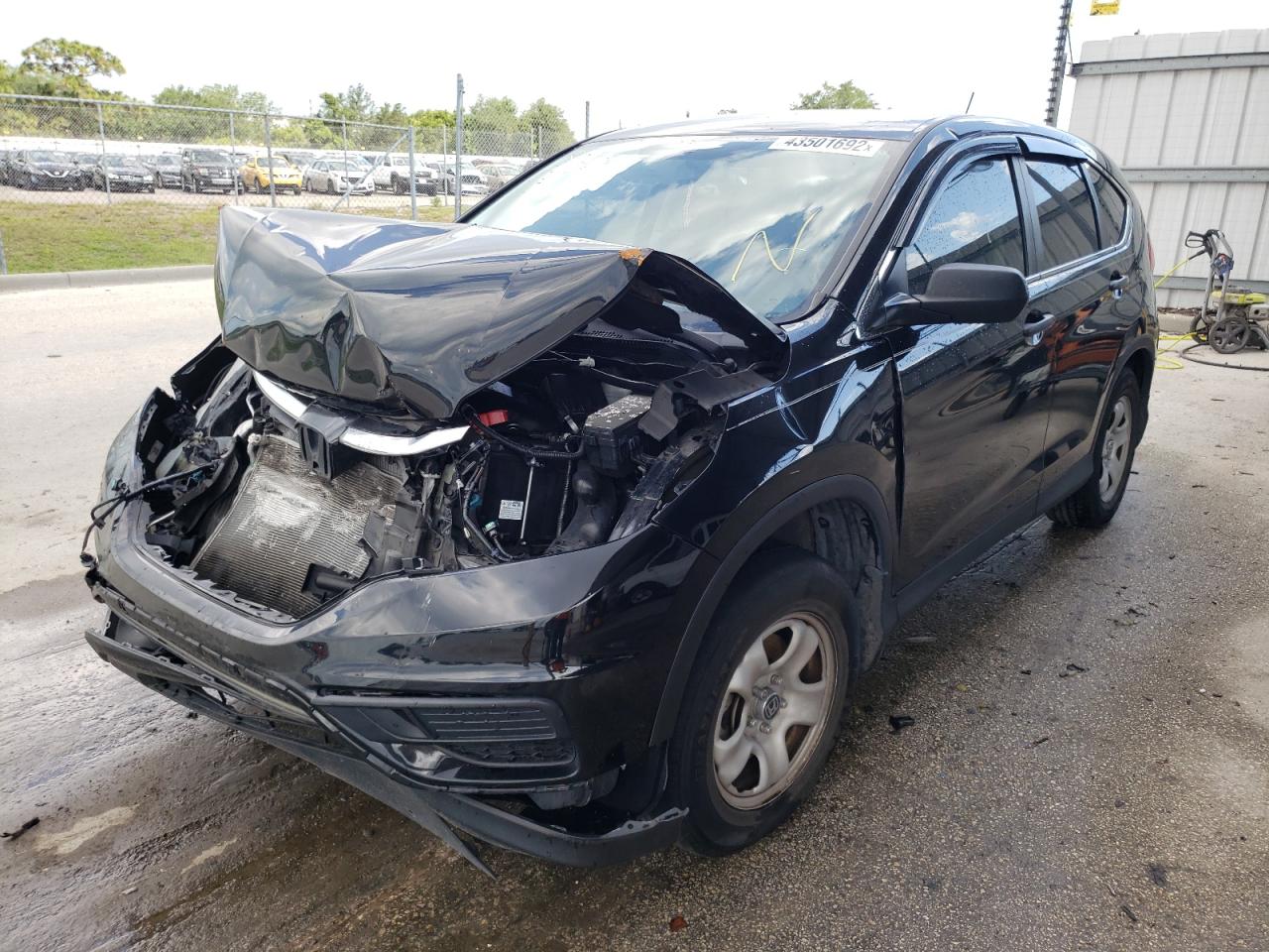 Photo 2 from auction – 2016 HONDA CR-V LX with VIN 2HKRM3H36GH554765