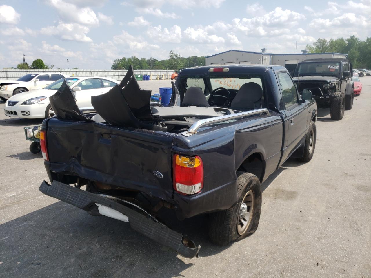 Photo 4 from auction – 1999 FORD RANGER with VIN 1FTYR10C5XUB95752