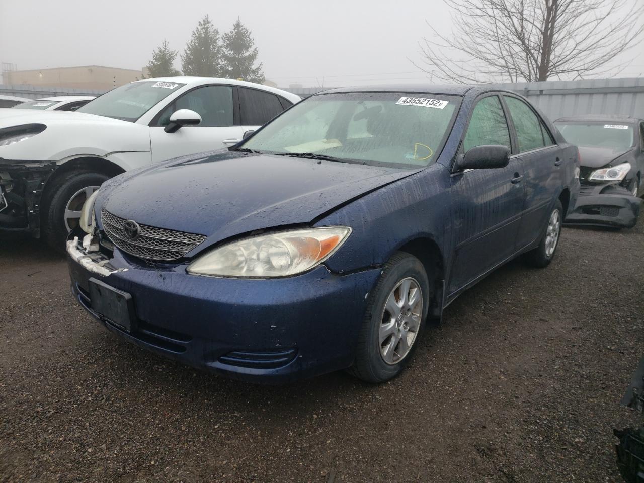 Photo 2 from auction – 2003 TOYOTA CAMRY LE with VIN JTDBF32K530120209