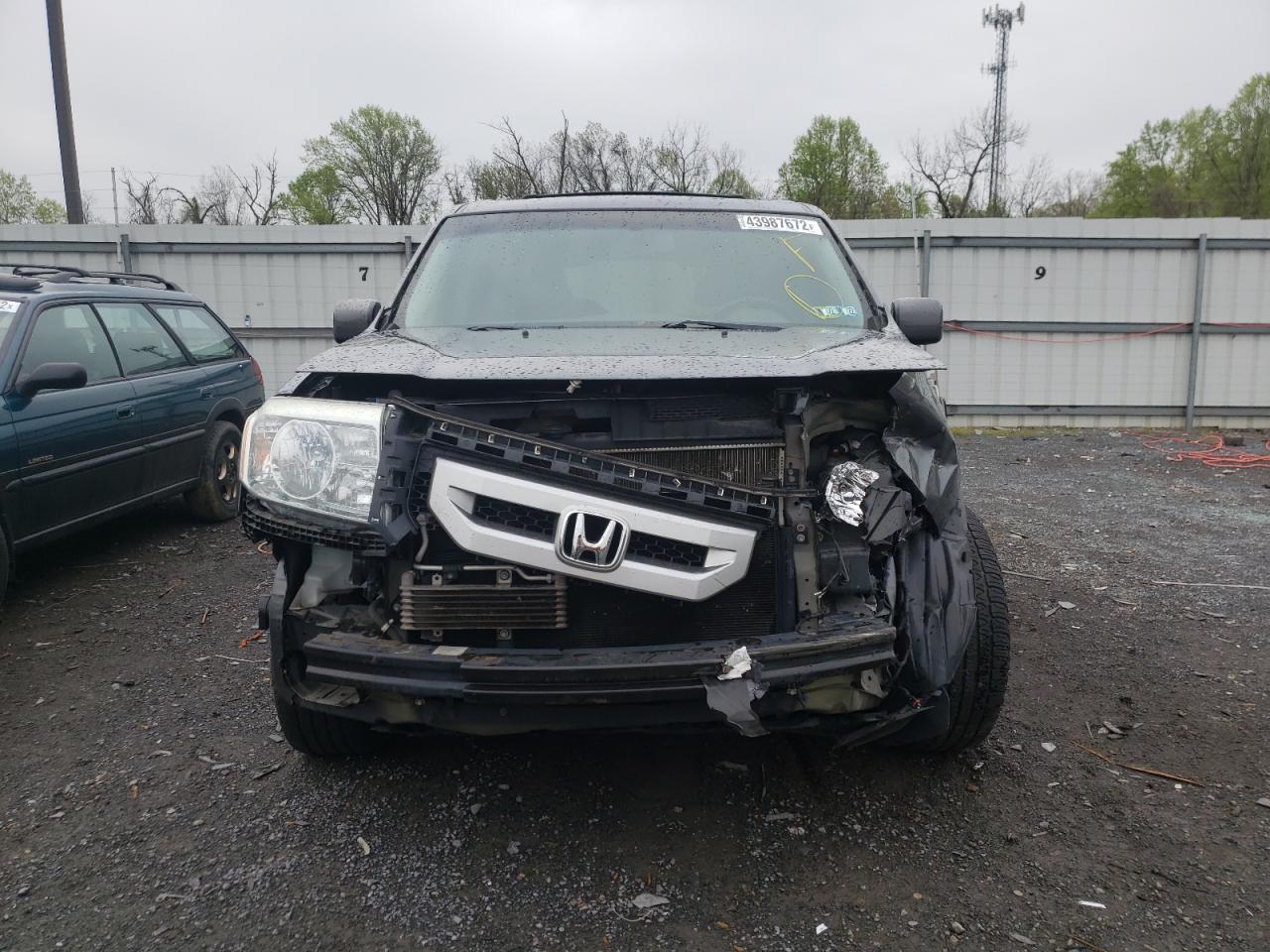 Photo 9 from auction – 2011 HONDA PILOT EXL with VIN 5FNYF4H56BB022968