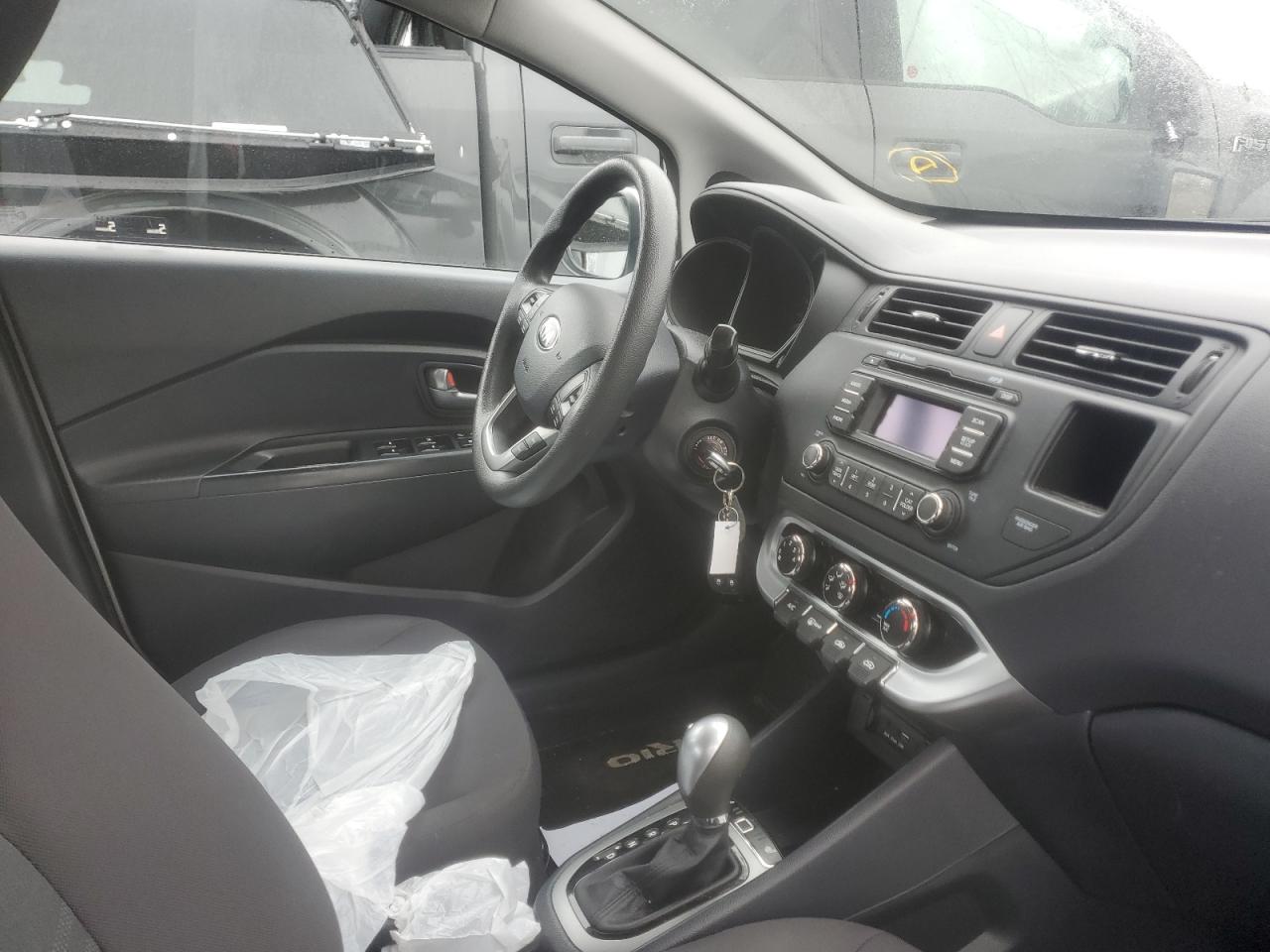 Photo 5 from auction – 2015 KIA RIO LX with VIN KNADM4A35F6516265