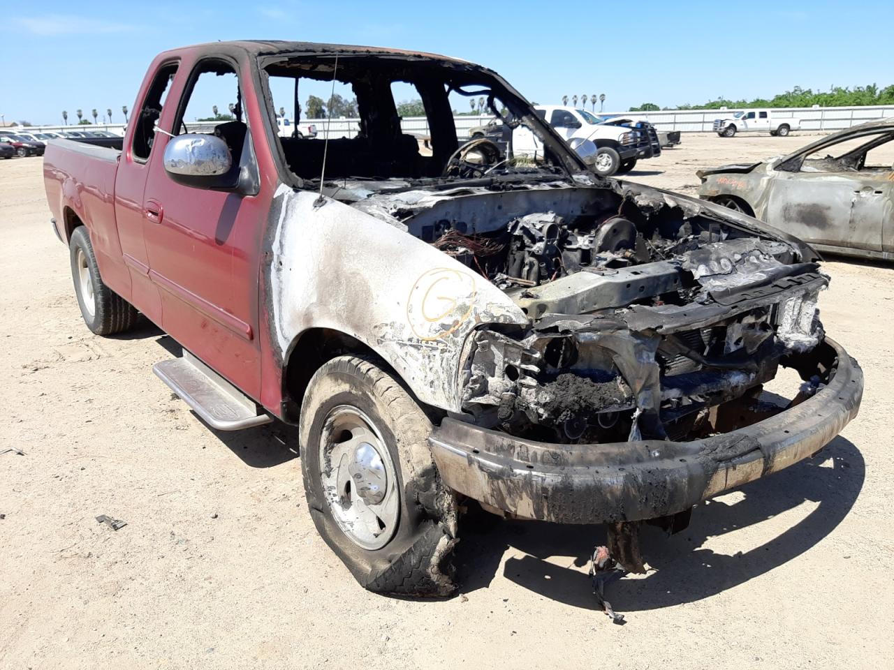 FORD F150 2002 with VIN 1FTRX17W52NB60626 - Photo from auction