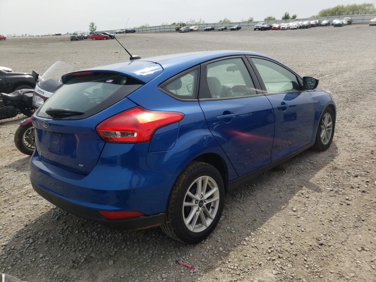 Photo 16 from auction – 2018 FORD FOCUS SE with VIN 1FADP3K26JL281711