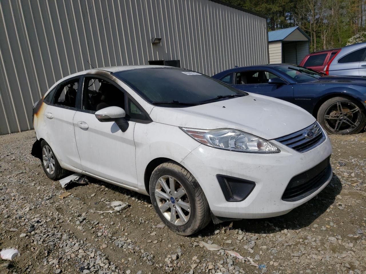FORD FIESTA SE 2013 with VIN 3FADP4BJ3DM170968 - Photo from auction