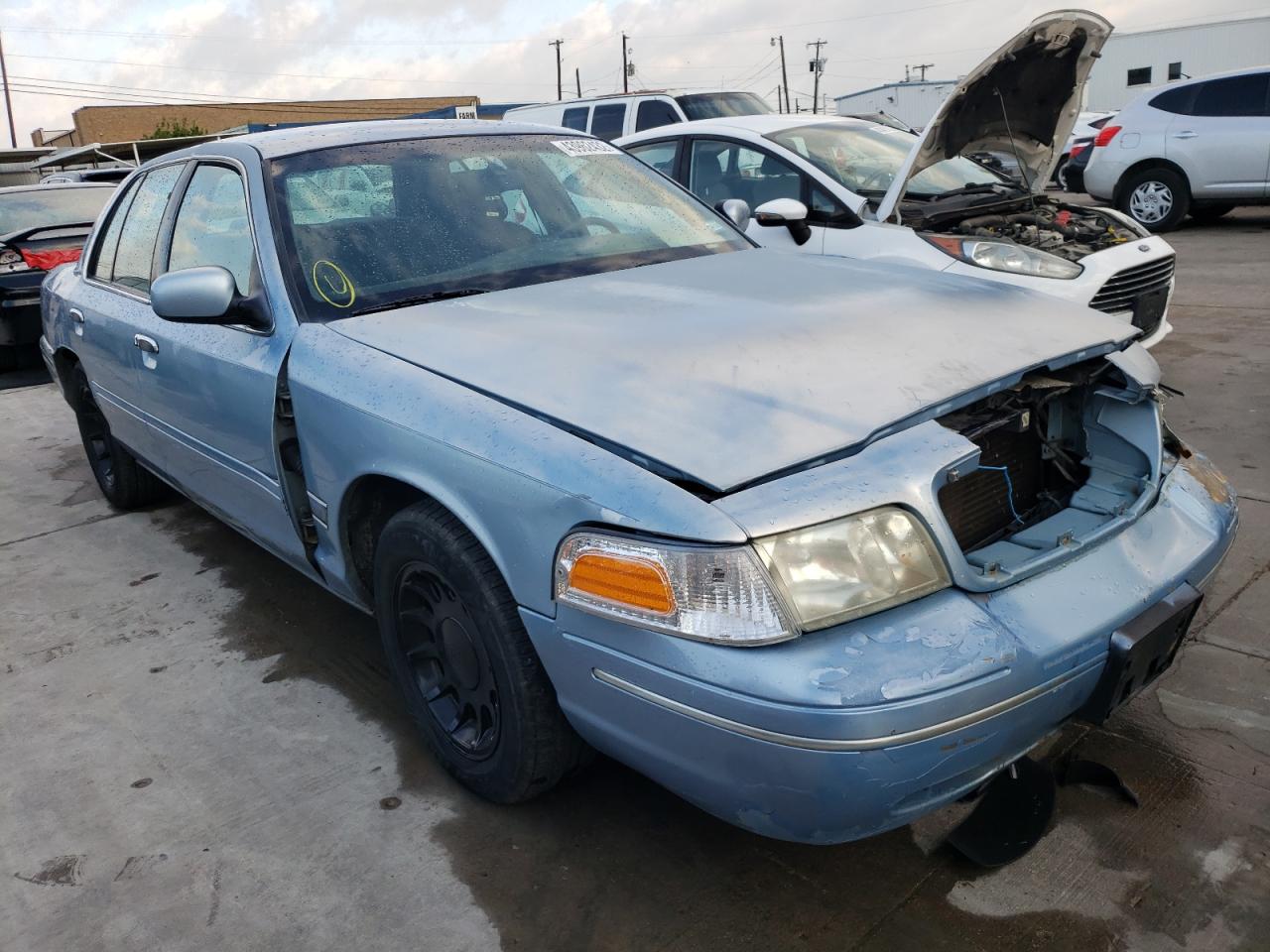 FORD CROWN VICT 1999 with VIN 2FAFP74W1XX229799 - Photo from auction