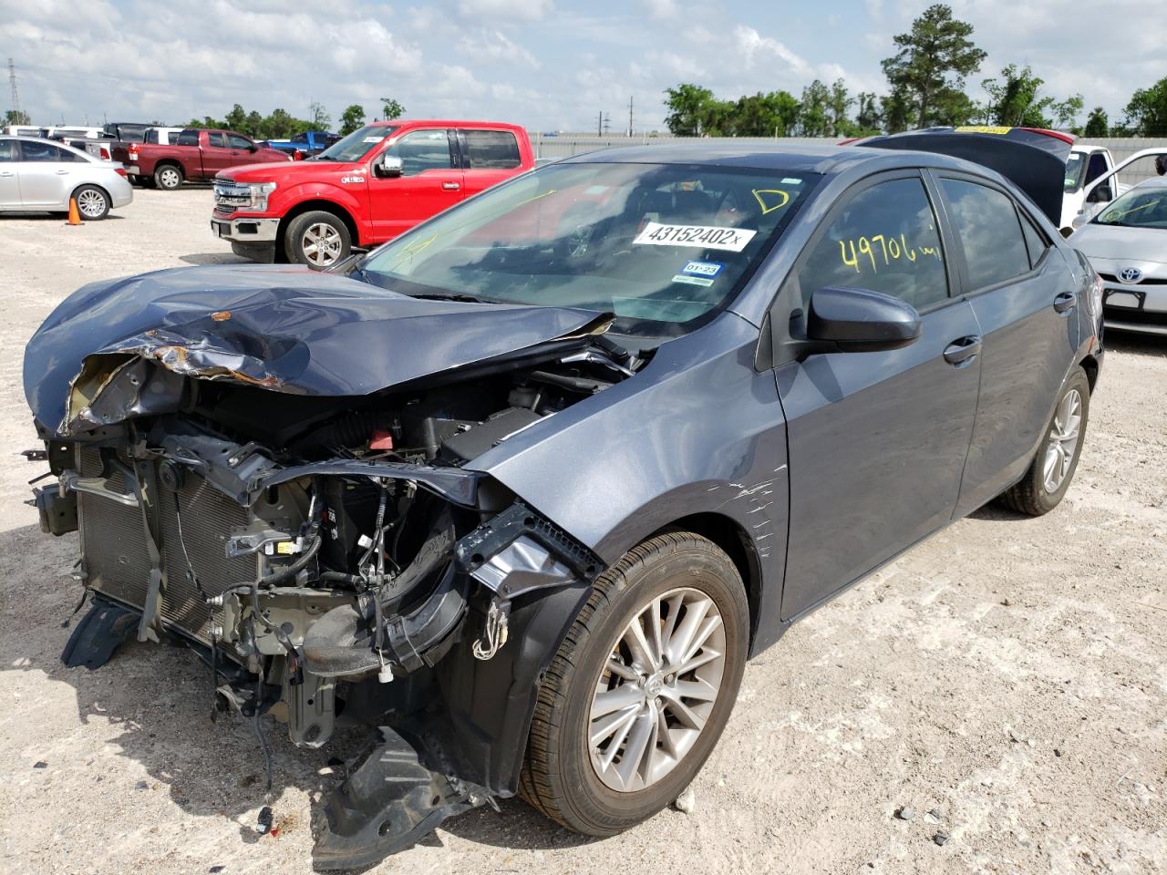 Photo 2 from auction – 2014 TOYOTA COROLLA L with VIN 5YFBURHE3EP019057