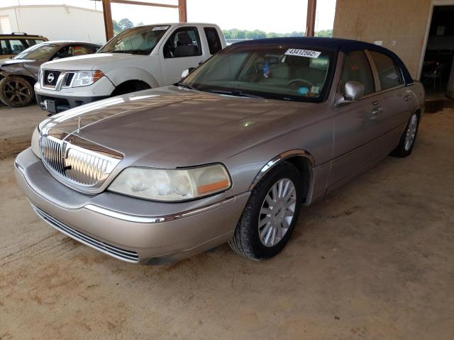 Photo 2 from auction – 2003 LINCOLN TOWN CAR E with VIN 1LNHM81WX3Y644650