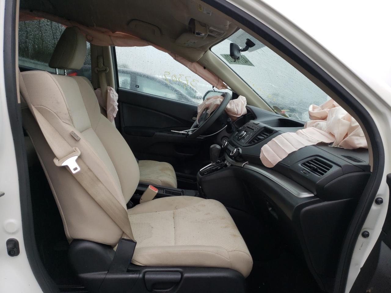 Photo 5 from auction – 2016 HONDA CR-V LX with VIN 5J6RM4H36GL122625