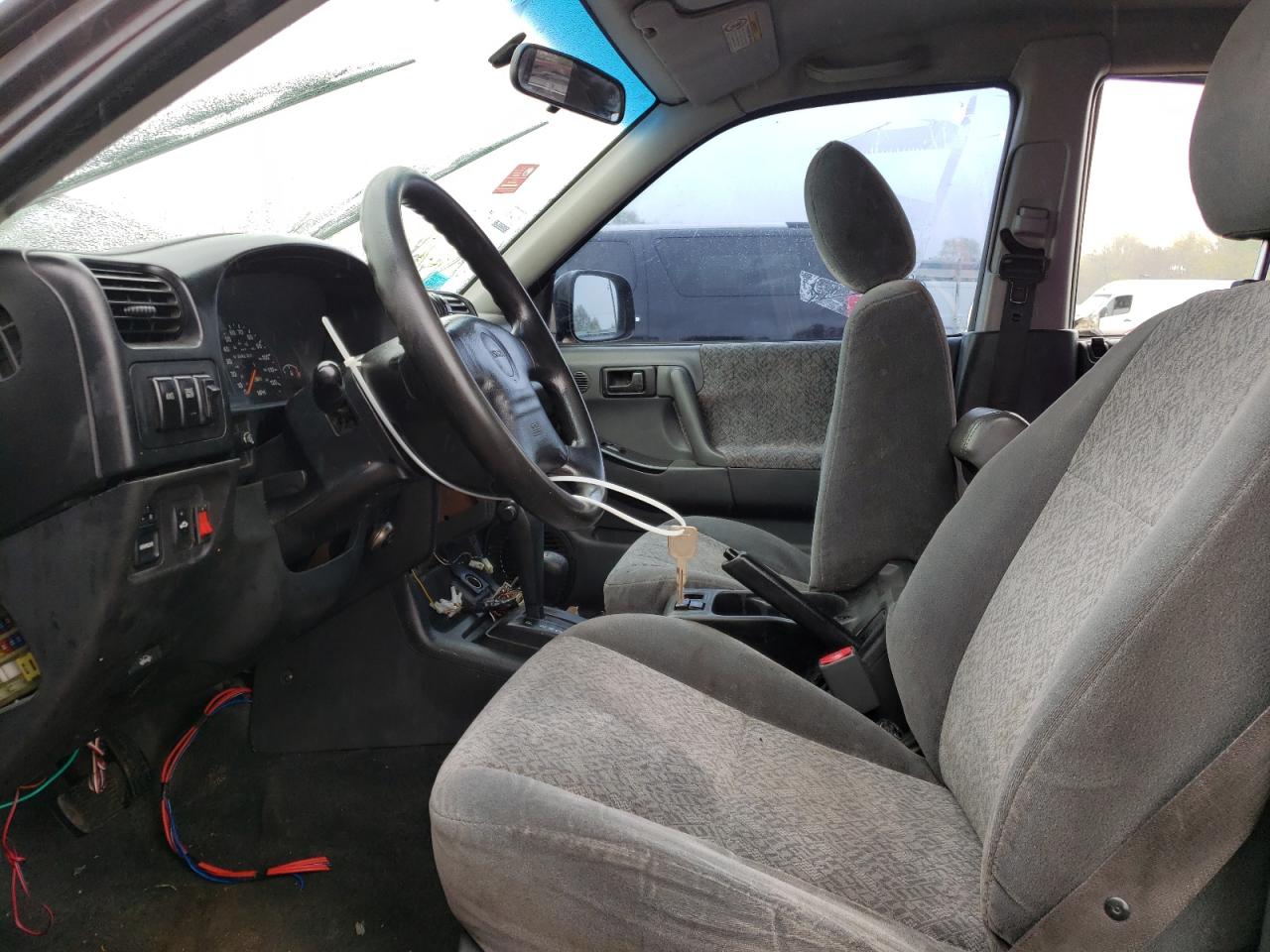 Photo 5 from auction – 1999 ISUZU RODEO S with VIN 4S2CM58W7X4318647