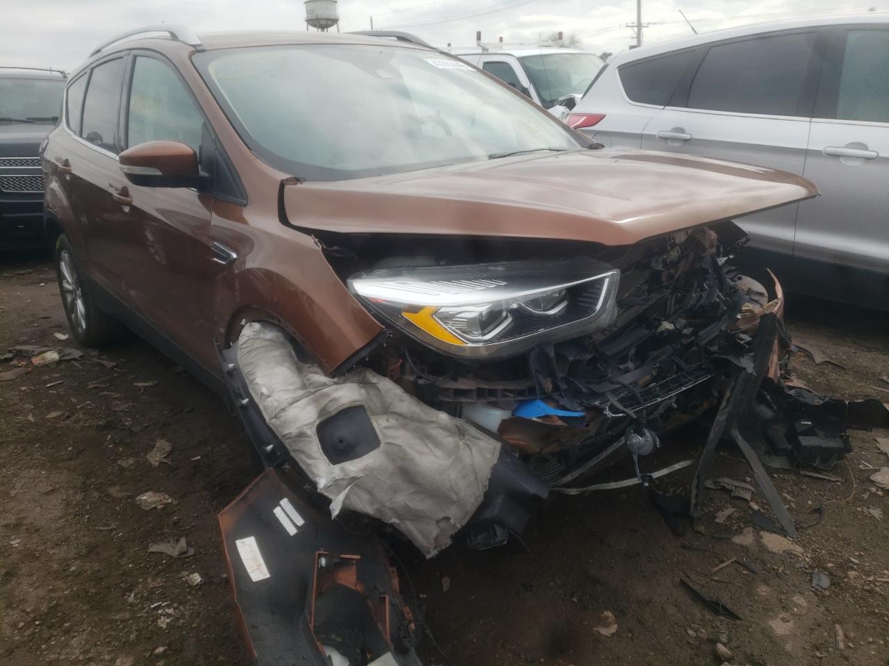 Photo 1 from auction – 2017 FORD ESCAPE TIT with VIN 1FMCU0JD9HUA48714