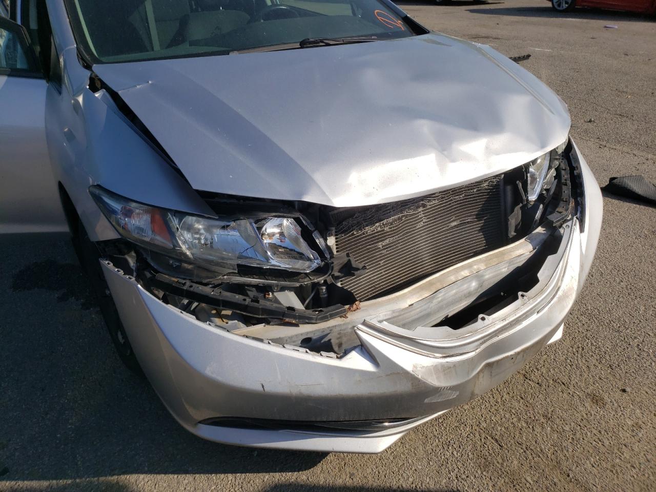Photo 9 from auction – 2013 HONDA CIVIC LX with VIN 19XFB2F58DE033070