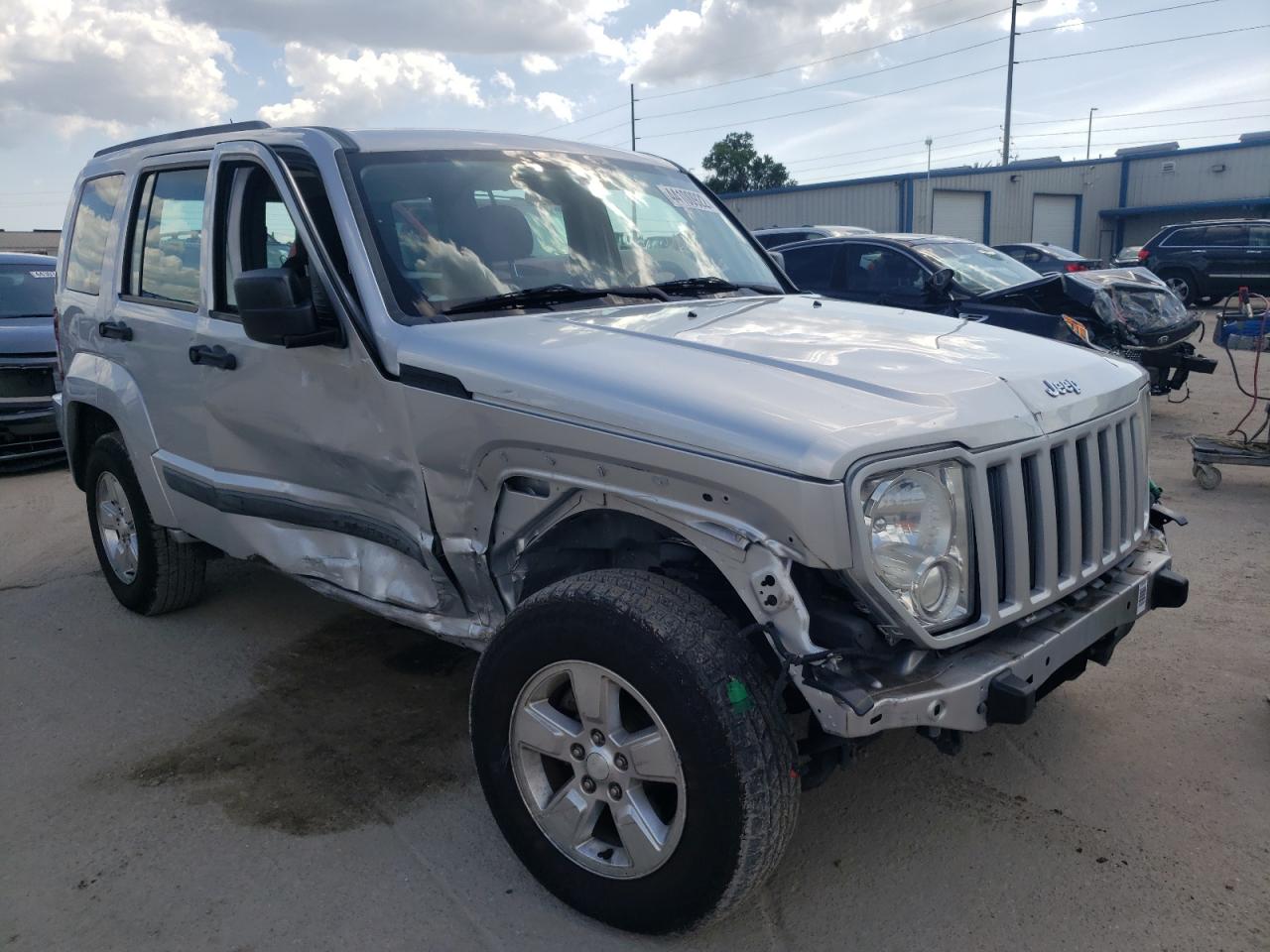 JEEP LIBERTY 2012 with VIN 1C4PJLAK0CW110867 - Photo from auction