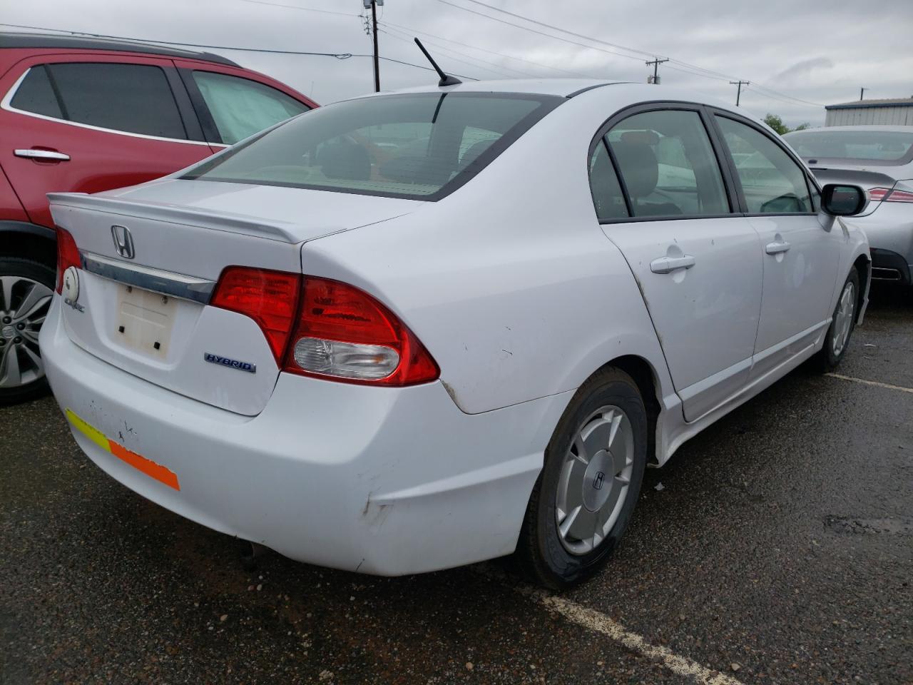 Photo 4 from auction – 2010 HONDA CIVIC HYBR with VIN JHMFA3F22AS007828