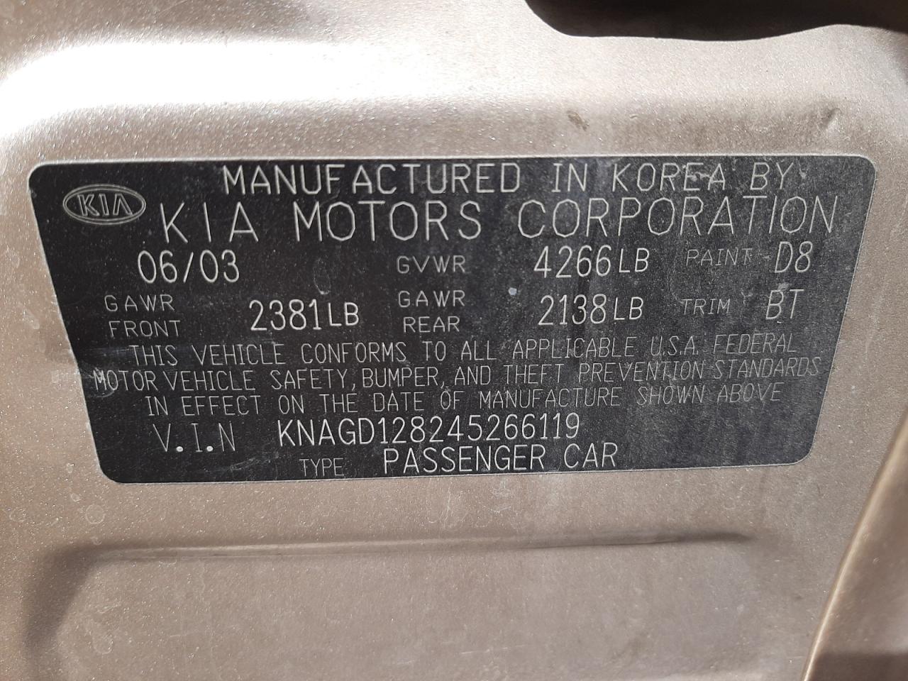 Photo 10 from auction – 2004 KIA OPTIMA LX with VIN KNAGD128245266119
