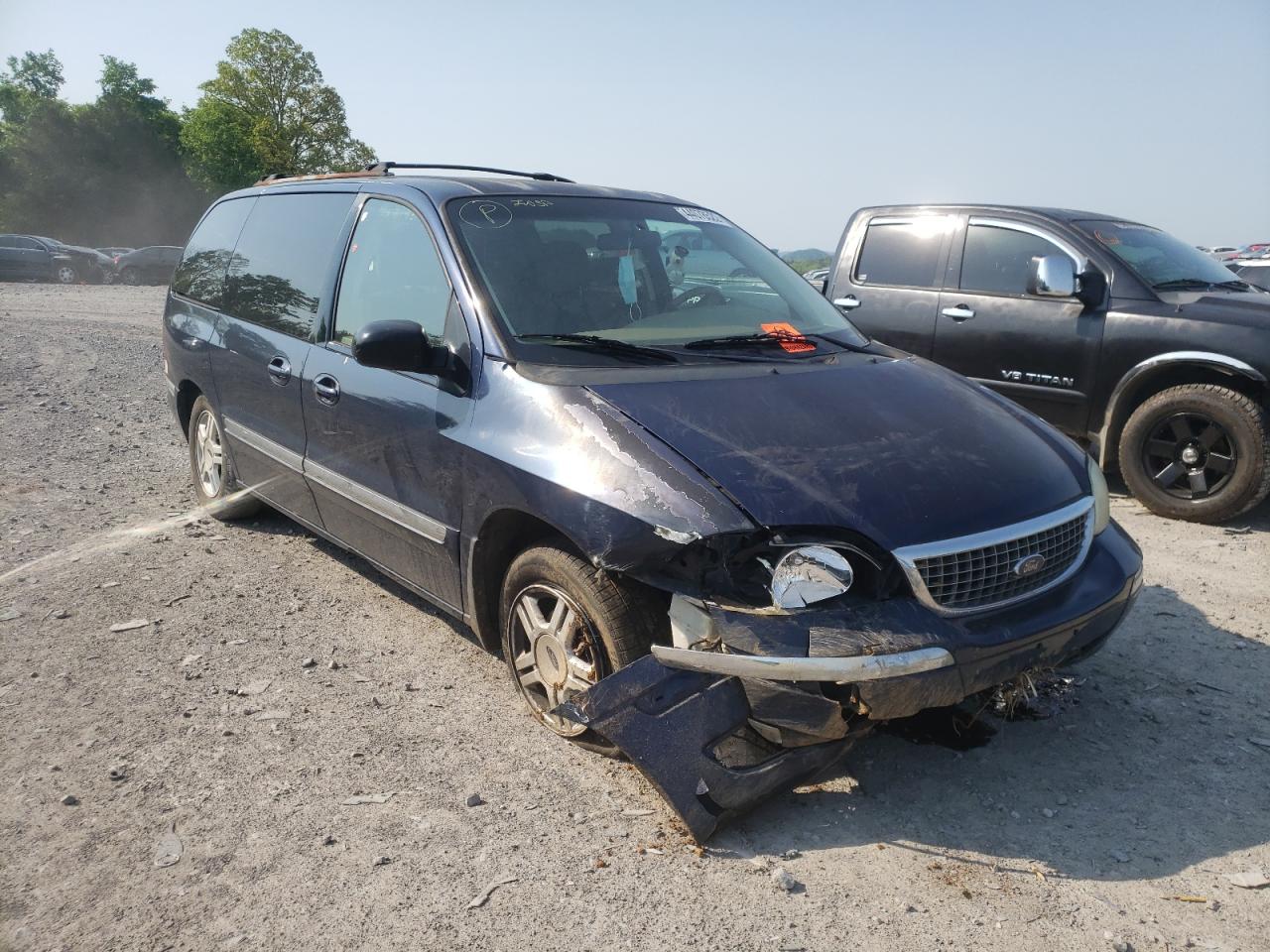 FORD WINDSTAR S 2002 with VIN 2FMDA52492BA13080 - Photo from auction
