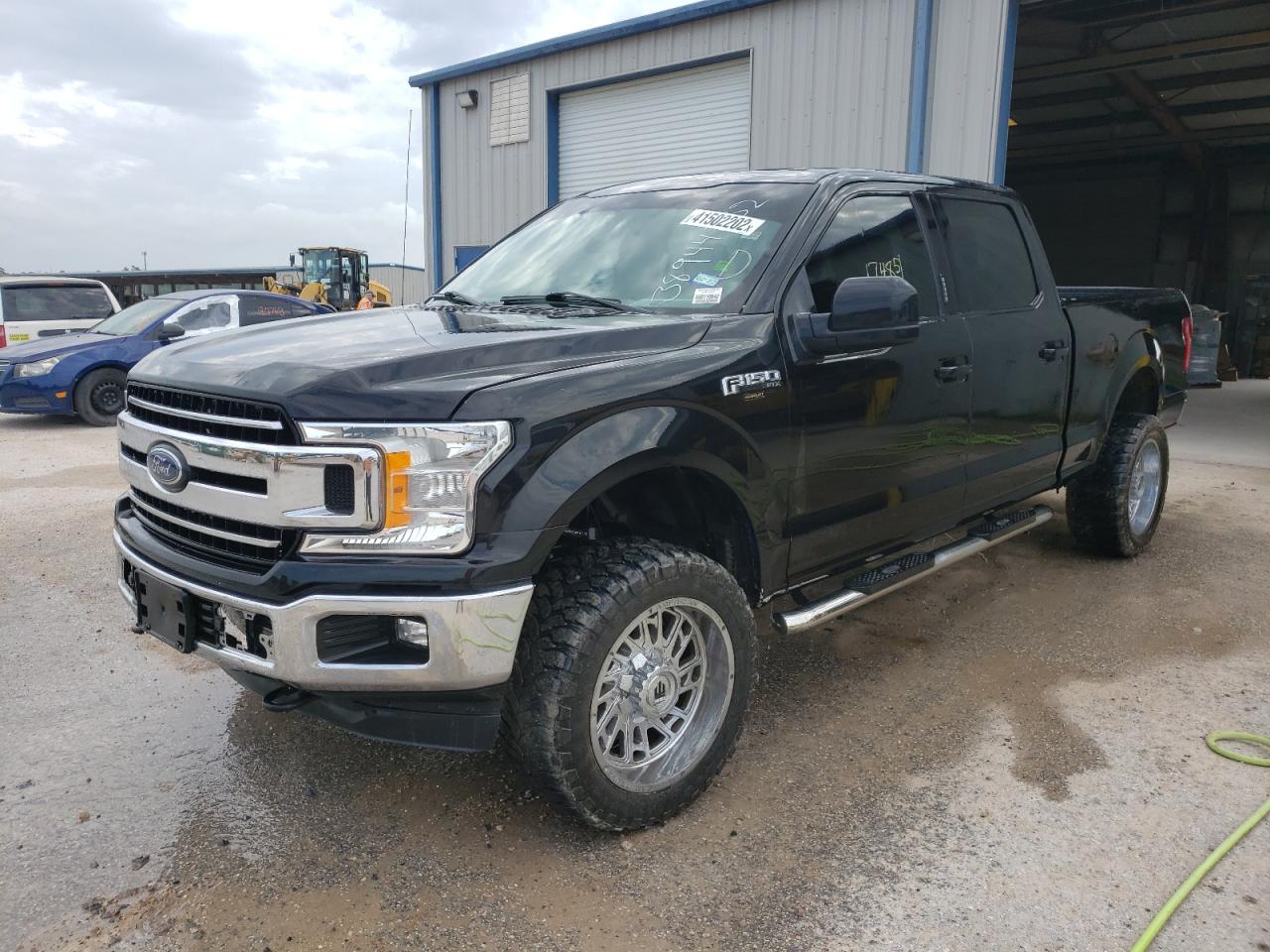 Photo 2 from auction – 2015 FORD F150 SUPER with VIN 1FTEW1CF4FKD62582