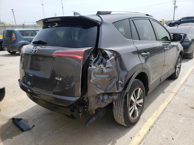 Photo 4 from auction – 2016 TOYOTA RAV4 XLE with VIN JTMWFREV2GJ095571