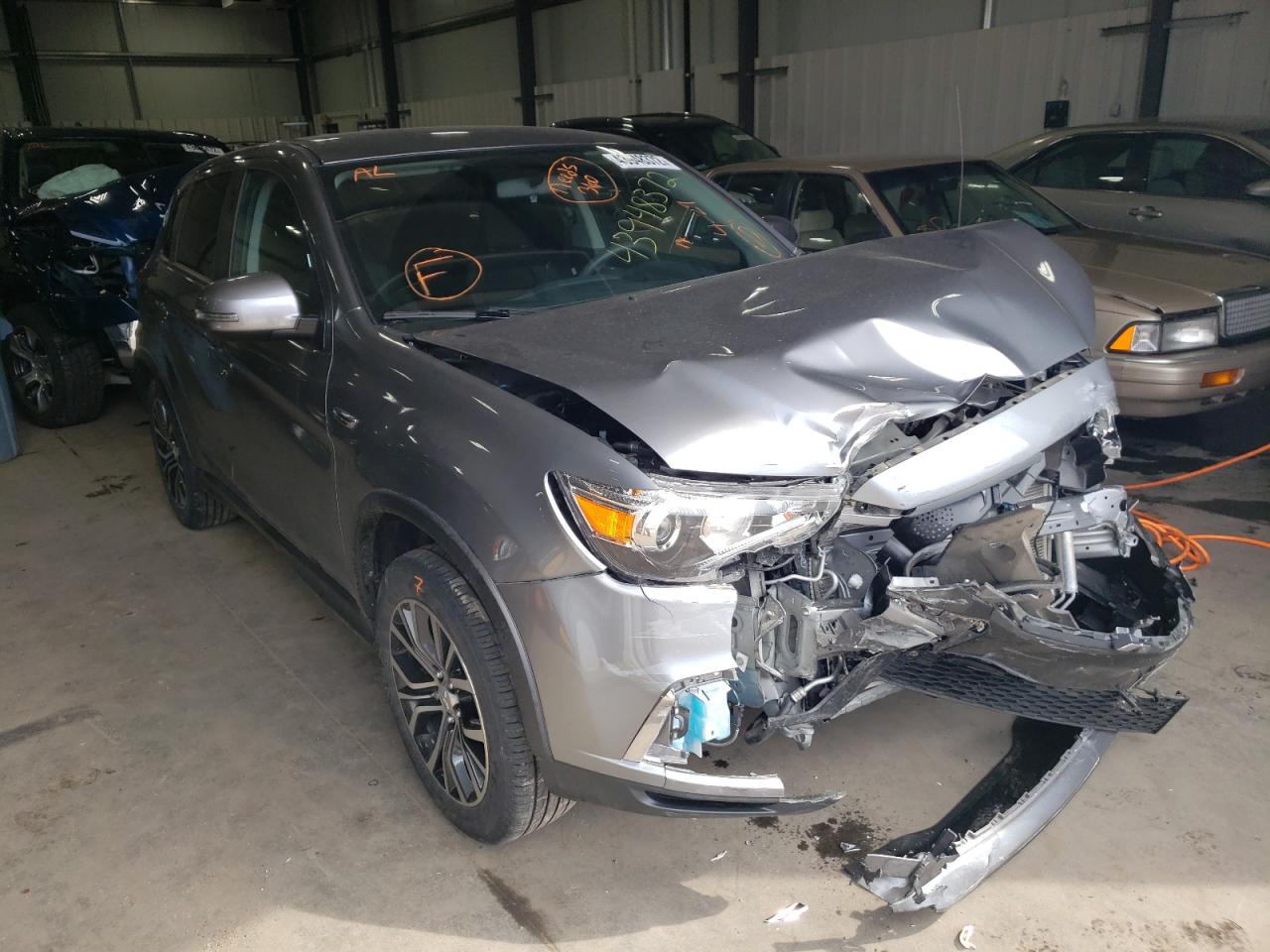 MITSUBISHI OUTLANDER 2018 with VIN JA4AR3AU2JU017075 - Photo from auction