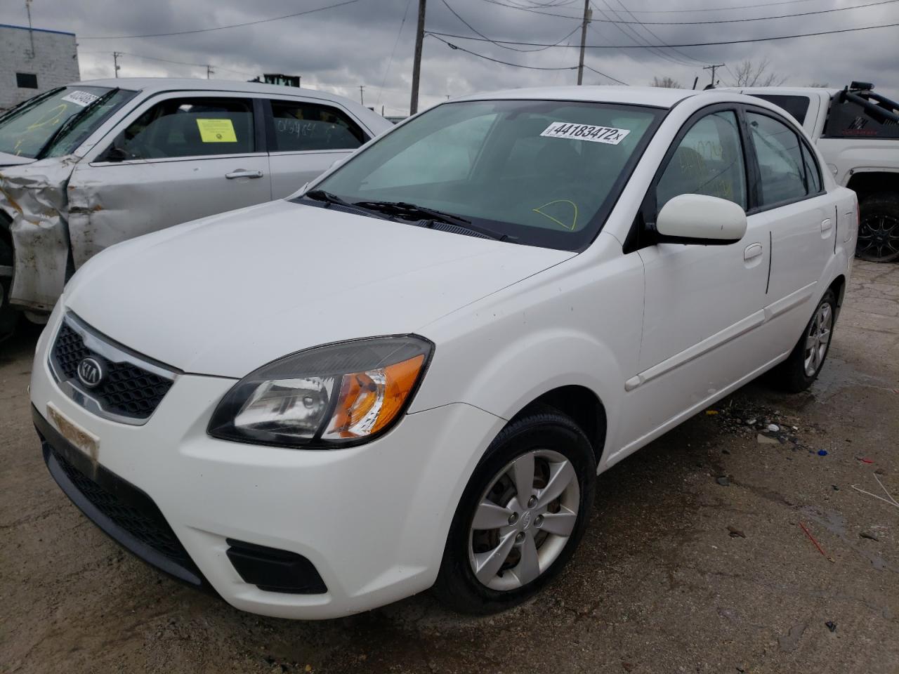 Photo 2 from auction – 2011 KIA RIO BASE with VIN KNADH4A38B6948458