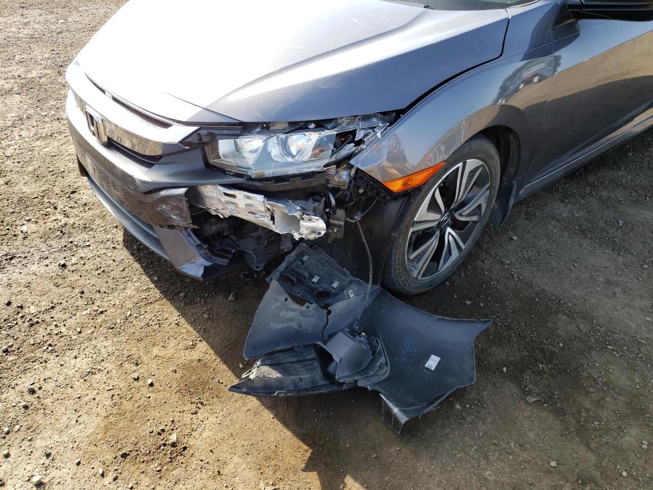 Photo 9 from auction – 2018 HONDA CIVIC EX with VIN JHMFC1F39JX018318