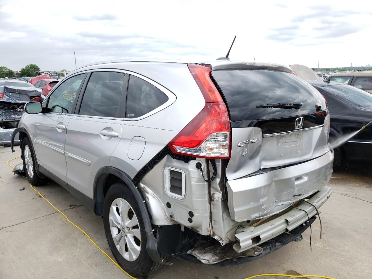 Photo 3 from auction – 2012 HONDA CR-V EXL with VIN 5J6RM3H78CL033226