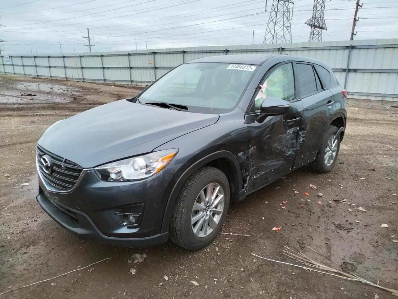 Photo 2 from auction – 2016 MAZDA CX-5 TOURI with VIN JM3KE2CY5G0919159
