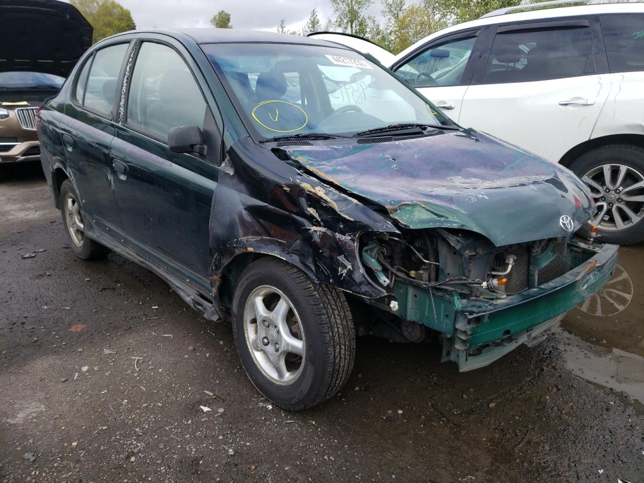 TOYOTA ECHO 2000 with VIN JTDBT1230Y0080313 - Photo from auction