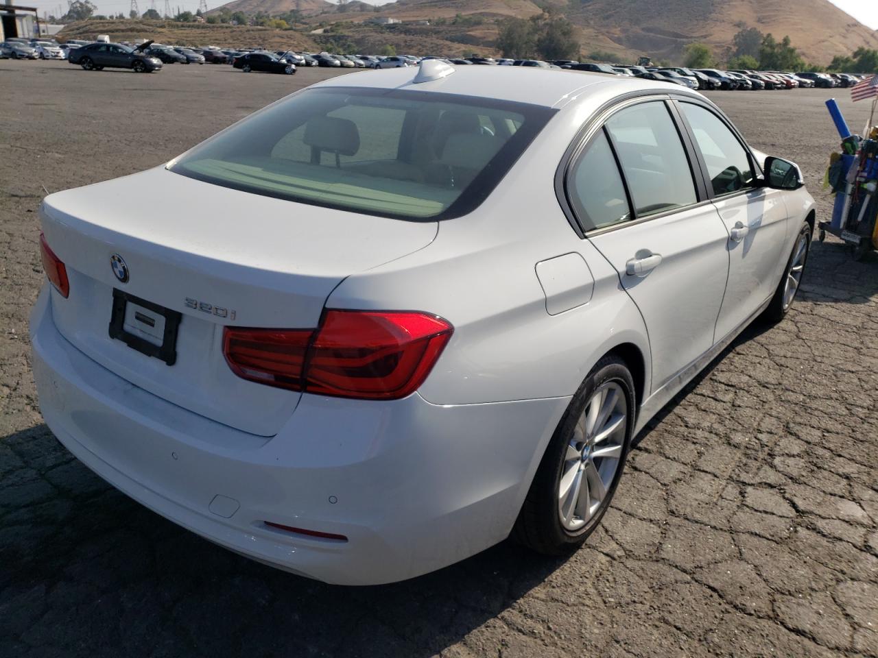 Photo 4 from auction – 2016 BMW 320 I with VIN WBA8E1G56GNT34829