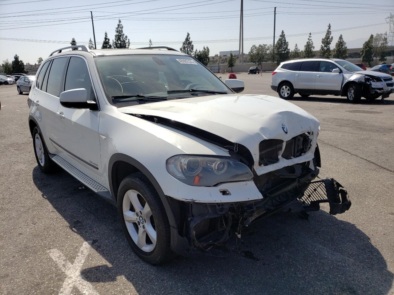 BMW X5 XDRIVE5 2011 with VIN 5UXZV8C59BL421004 - Photo from auction
