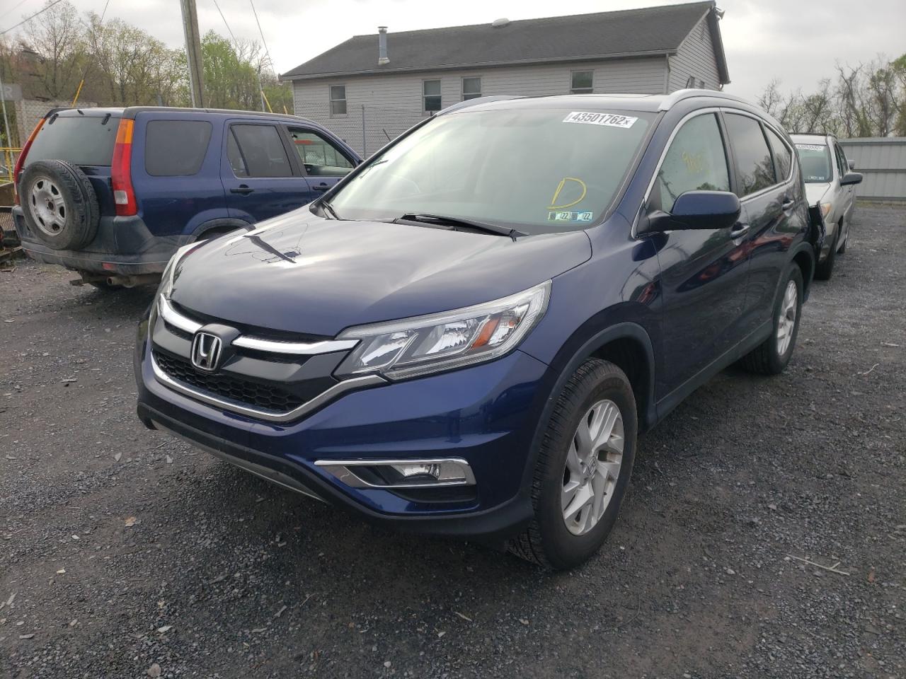 Photo 2 from auction – 2016 HONDA CR-V EXL with VIN 2HKRM4H75GH699305