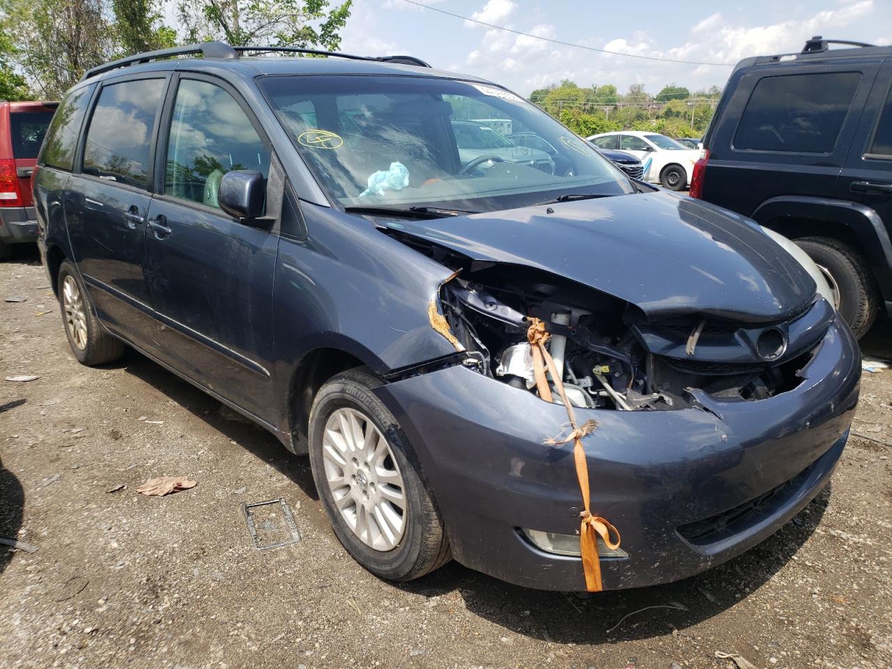 TOYOTA SIENNA XLE 2010 with VIN 5TDYK4CC8AS329165 - Photo from auction