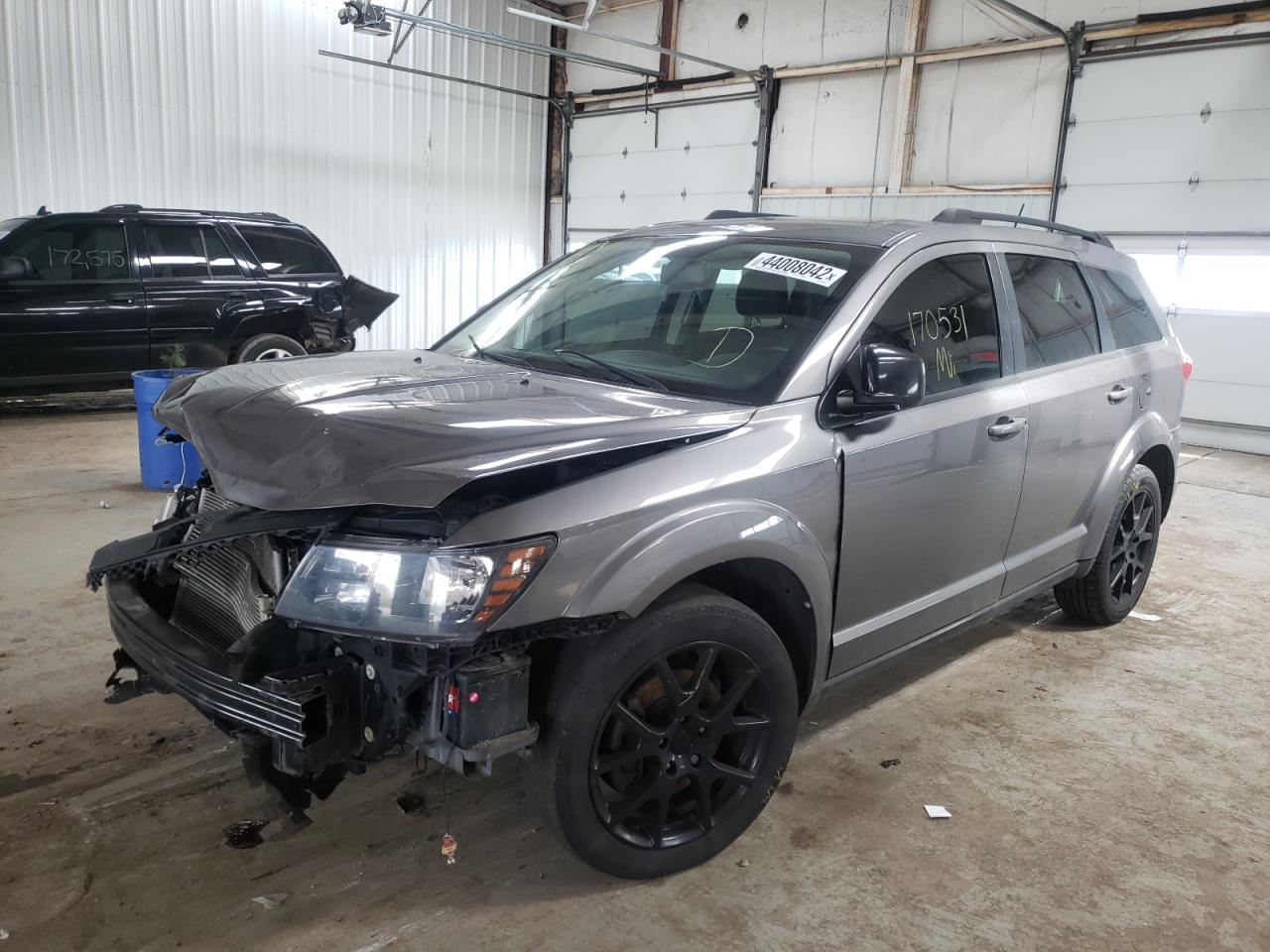 Photo 2 from auction – 2013 DODGE JOURNEY SX with VIN 3C4PDCBG3DT690995