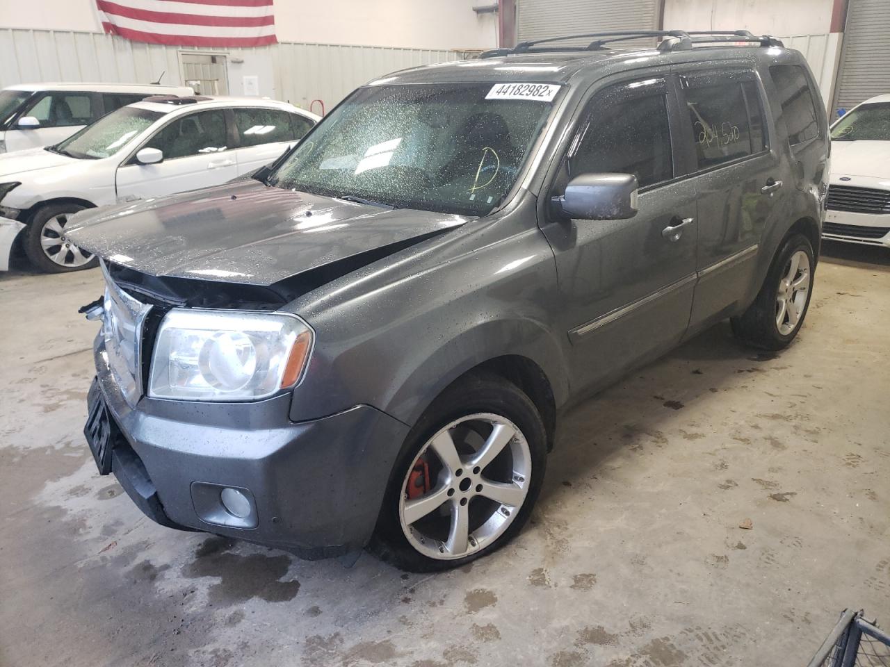 Photo 2 from auction – 2010 HONDA PILOT TOUR with VIN 5FNYF4H99AB024571